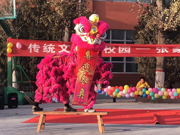 张家口市龙狮与武术表演高校联谊演出在世界杯官网举行